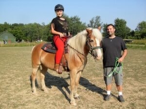 Child on horse with handler — Avon Lake Ohio